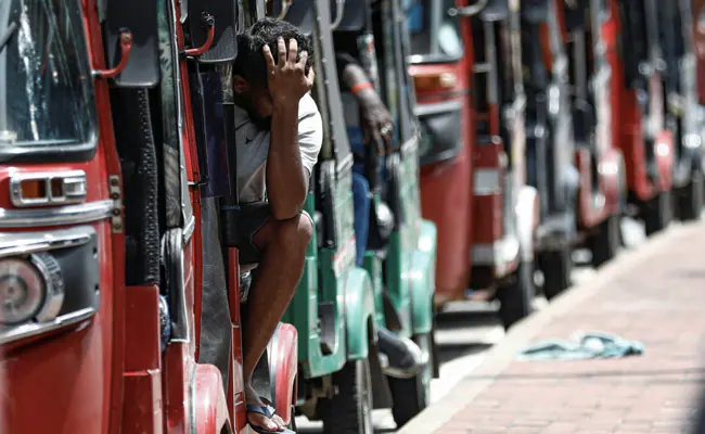 In crisis-hit Sri Lanka, ex-cricketer serves tea, snacks to people lining up for fuel